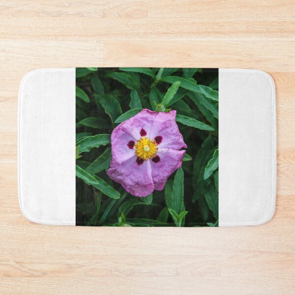 Item preview, Pink Wildflower Close-Up With Yellow Stamen and Single Petal Detail In Natural Green Background designed and sold by Nmallia.
