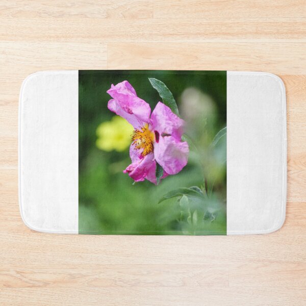 Item preview, Pink Wildflower Close-Up With Yellow Stamen and Single Petal Detail In Natural Green Background designed and sold by Nmallia.