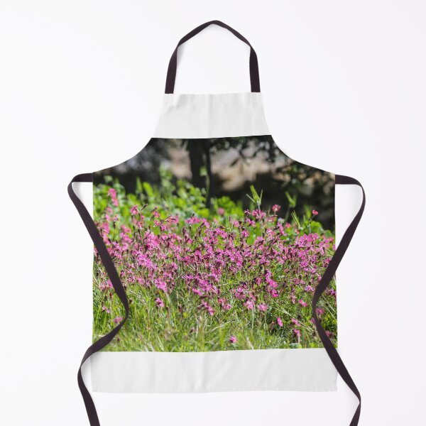 Item preview, Pink Wildflowers in a Sunny Spring Meadow With Green Grass and Soft Background Trees designed and sold by Nmallia.