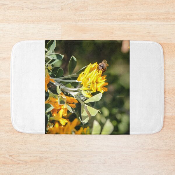 Item preview, Honeybee Pollinating Bright Yellow Wildflowers Close-Up On Green Shrub In Sunny Summer Garden Macro designed and sold by Nmallia.