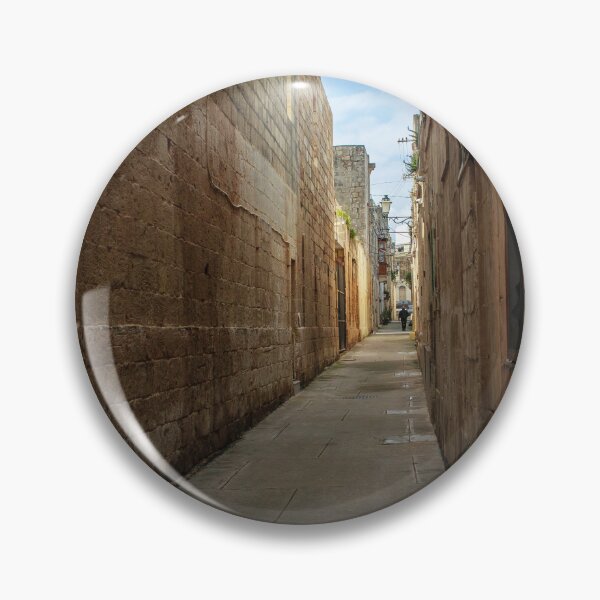 Item preview, Narrow Stone Alley Through Historic Old Town With Sunlit Passage And Distant Figure designed and sold by Nmallia.