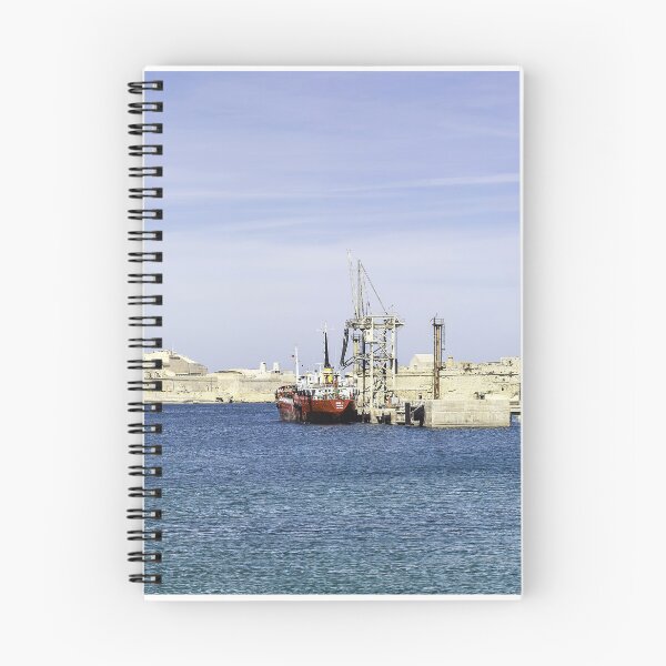 Item preview, Mediterranean Harbor With Historic Fortresses, Calm Blue Sea and Docked Boat Under Clear Sky designed and sold by Nmallia.