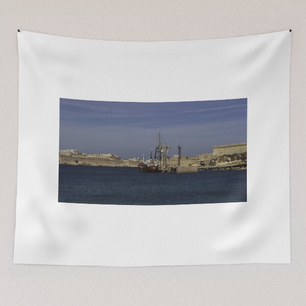 Item preview, Red Cargo Ship Docked Beside Historic Coastal Fort At Calm Harbor Under Blue Sky designed and sold by Nmallia.