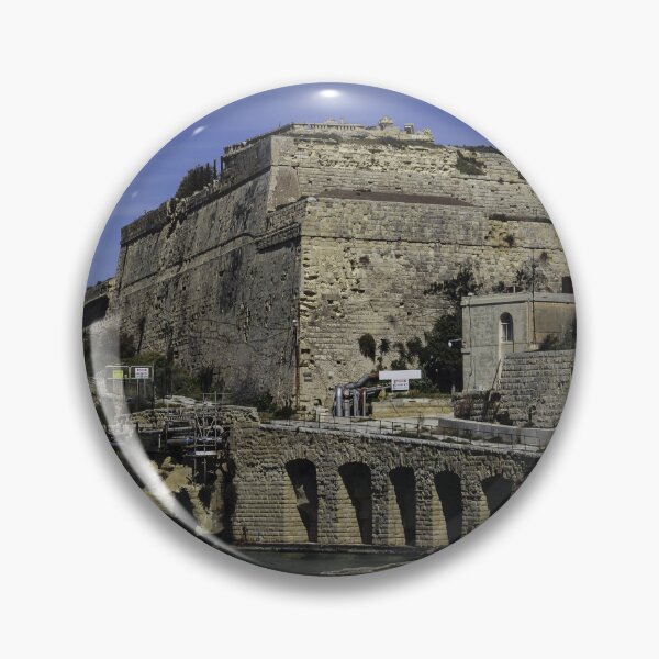 Item preview, Historic Coastal Fortress and Stone Bridge Over Calm Mediterranean Waters With Rugged Ramparts and Waterfront Road designed and sold by Nmallia.