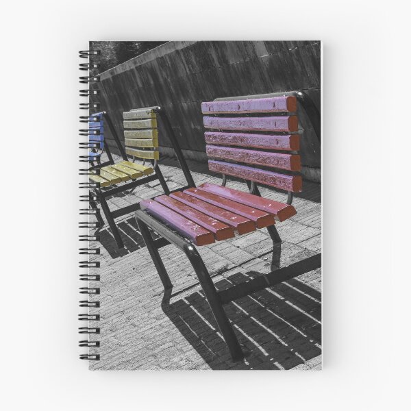 Item preview, Colorful Wooden Benches in a Row Along Urban Walkway With Strong Shadows and Selective Color designed and sold by Nmallia.