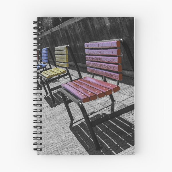 Item preview, Colorful Wooden Benches in a Row Along Urban Walkway With Strong Shadows and Selective Color designed and sold by Nmallia.