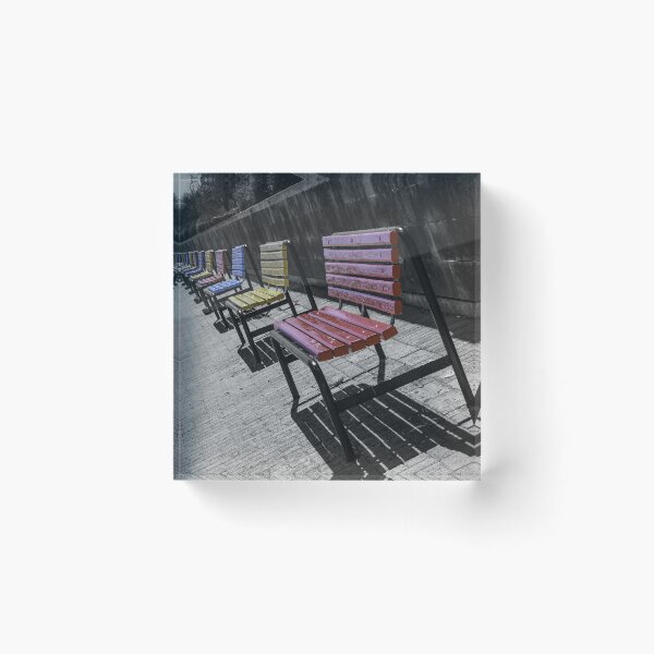 Item preview, Colorful Wooden Benches in a Row Along Urban Walkway With Strong Shadows and Selective Color designed and sold by Nmallia.