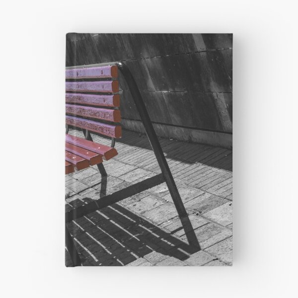 Item preview, Colorful Wooden Benches in a Row Along Urban Walkway With Strong Shadows and Selective Color designed and sold by Nmallia.