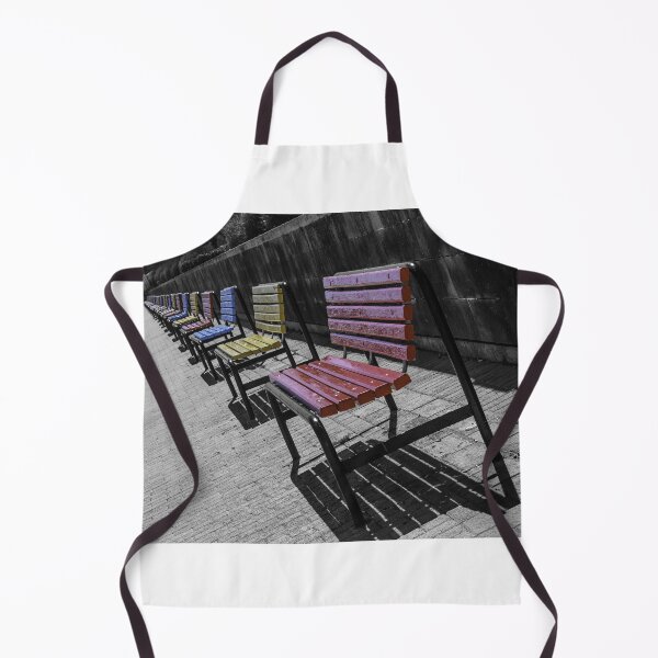 Item preview, Colorful Wooden Benches in a Row Along Urban Walkway With Strong Shadows and Selective Color designed and sold by Nmallia.