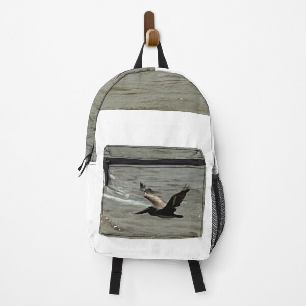 Item preview, Brown Pelican Soaring Above Rough Ocean Waves. designed and sold by Pearls1.