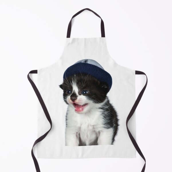 Item preview, Cozy Winter Kitten in Beanie Poster - Tiny Meow Tuxedo Cat Sticker - Hipster Pet Print for Thermal Mugs and Chunky Sweaters designed and sold by WildGentlemen.