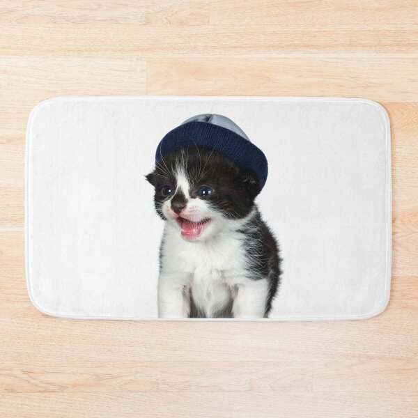 Item preview, Cozy Winter Kitten in Beanie Poster - Tiny Meow Tuxedo Cat Sticker - Hipster Pet Print for Thermal Mugs and Chunky Sweaters designed and sold by WildGentlemen.
