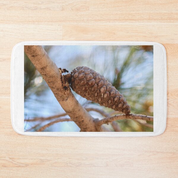 Item preview, Close-Up Pine Cone On Branch With Soft Focus Pine Needles And Natural Outdoor Lighting designed and sold by Nmallia.
