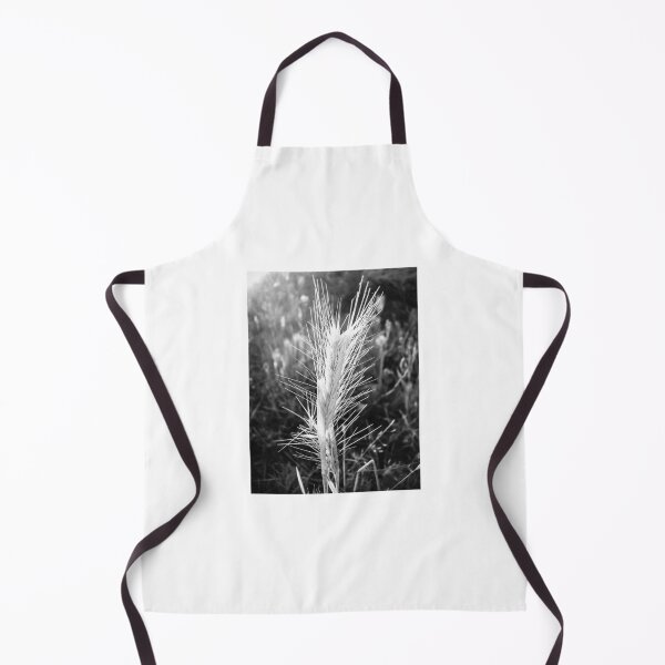Item preview, Black and White Close-Up of Wild Wheat Grass Spike in Sunlit Field Showing Texture and Detail designed and sold by Nmallia.