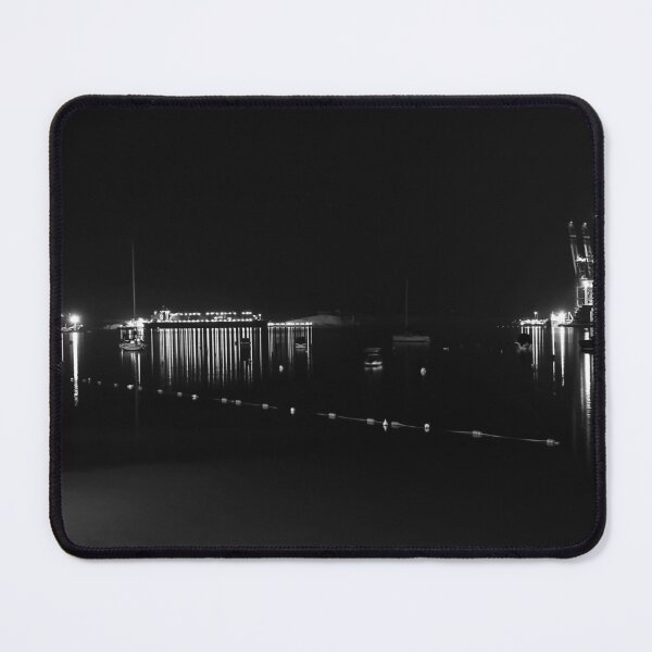 Item preview, Nighttime Container Port With Illuminated Gantry Cranes and Reflections on Calm Harbor Waters designed and sold by Nmallia.