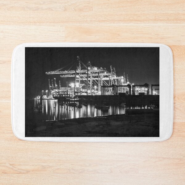 Item preview, Nighttime Container Port With Illuminated Gantry Cranes and Reflections on Calm Harbor Waters designed and sold by Nmallia.