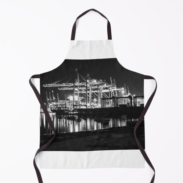 Item preview, Nighttime Container Port With Illuminated Gantry Cranes and Reflections on Calm Harbor Waters designed and sold by Nmallia.