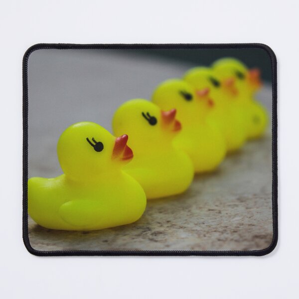 Item preview, Row Of Yellow Rubber Duck Toys Lined Up Evoking Playful Bath Time And Childhood Memories designed and sold by Nmallia.