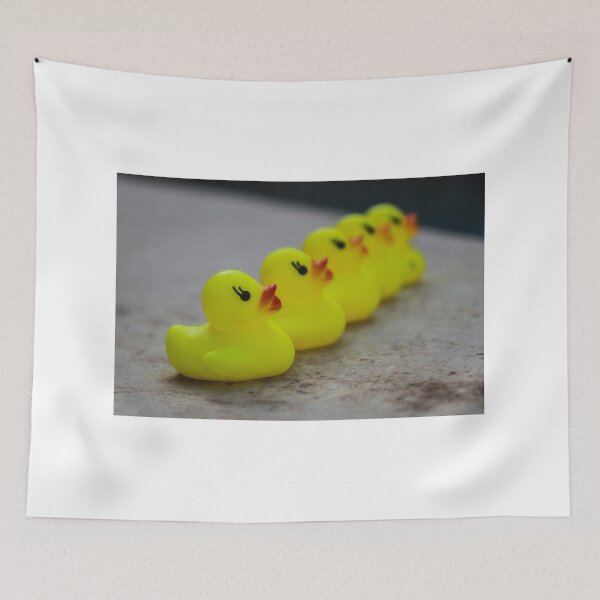 Item preview, Row Of Yellow Rubber Duck Toys Lined Up Evoking Playful Bath Time And Childhood Memories designed and sold by Nmallia.