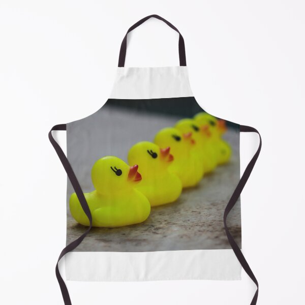 Item preview, Row Of Yellow Rubber Duck Toys Lined Up Evoking Playful Bath Time And Childhood Memories designed and sold by Nmallia.