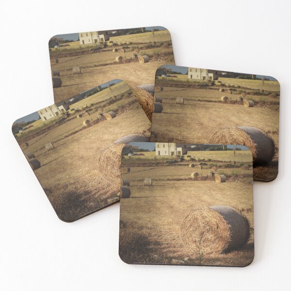 Item preview, Golden Hay Bales in Harvested Field Near Rural Farmhouses at Sunset Countryside Landscape designed and sold by Nmallia.