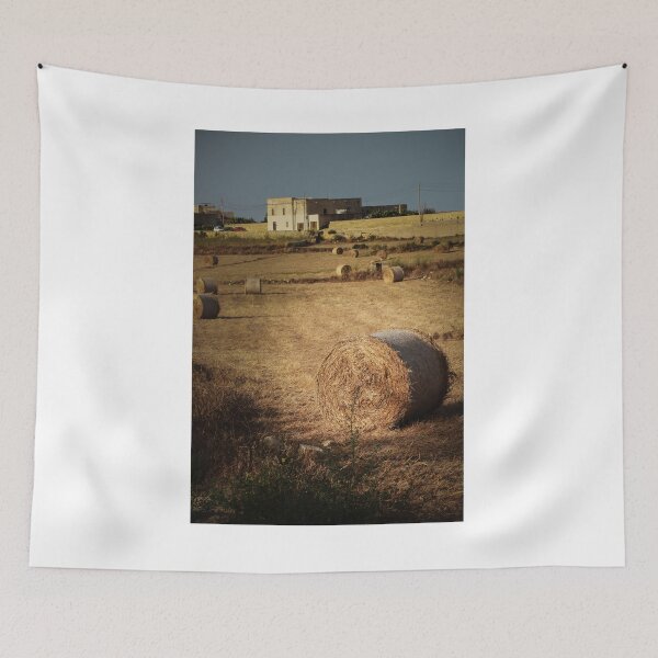 Item preview, Golden Hay Bales in Harvested Field Near Rural Farmhouses at Sunset Countryside Landscape designed and sold by Nmallia.
