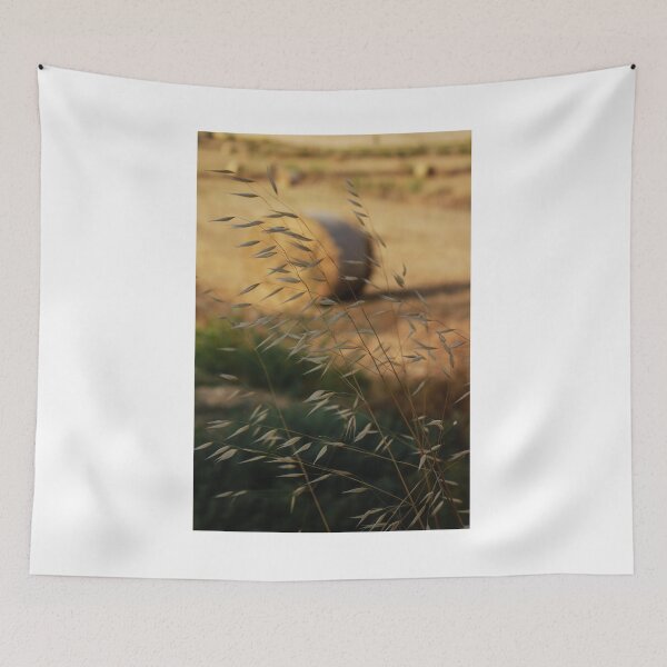 Item preview, Golden Hay Bales in Harvested Field Near Rural Farmhouses at Sunset Countryside Landscape designed and sold by Nmallia.