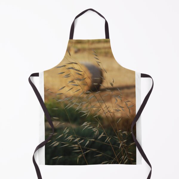 Item preview, Golden Hay Bales in Harvested Field Near Rural Farmhouses at Sunset Countryside Landscape designed and sold by Nmallia.