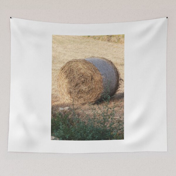 Item preview, Golden Hay Bales in Harvested Field Near Rural Farmhouses at Sunset Countryside Landscape designed and sold by Nmallia.