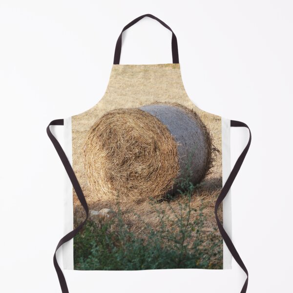 Item preview, Golden Hay Bales in Harvested Field Near Rural Farmhouses at Sunset Countryside Landscape designed and sold by Nmallia.