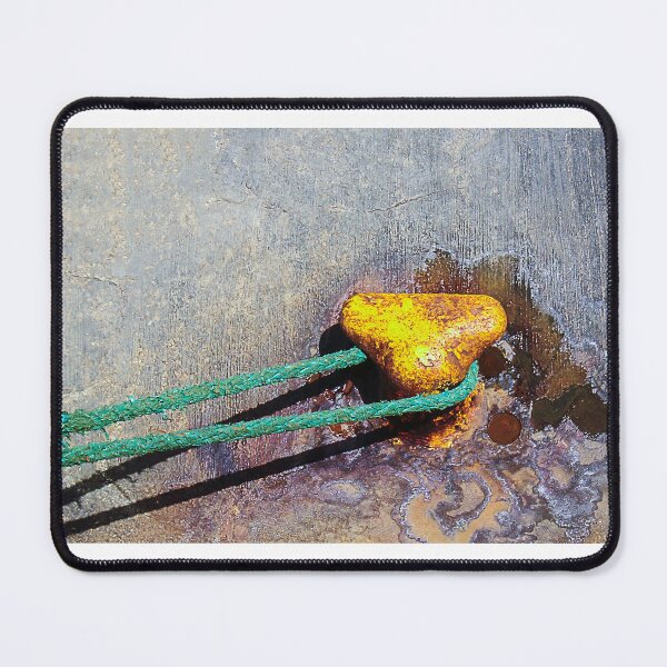 Item preview, Rusty Yellow Mooring Bollard With Green Rope Tied To Weathered Concrete Dock Close-Up designed and sold by Nmallia.