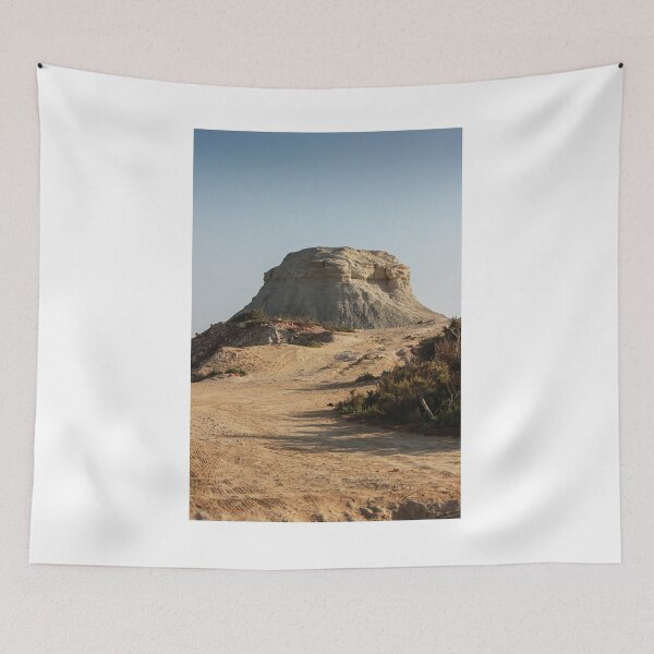 Item preview, Desert Butte Landscape With Eroded Rock Formation Under Clear Blue Sky And Sandy Track designed and sold by Nmallia.