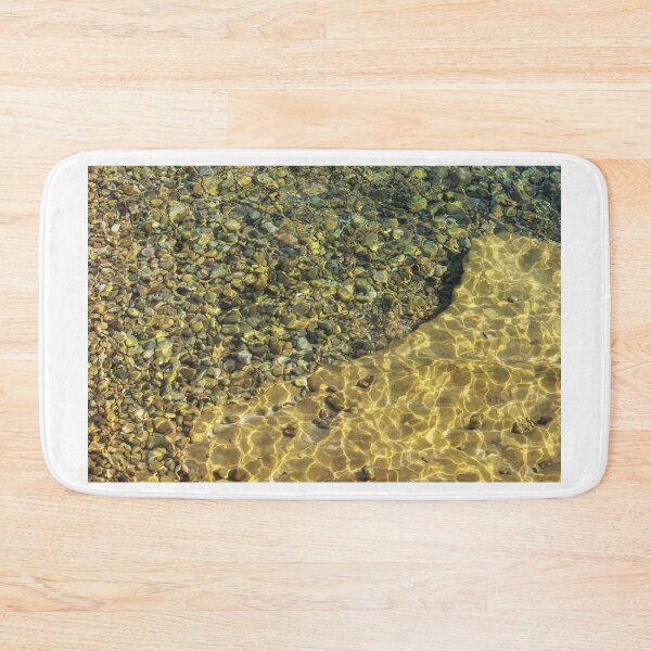 Item preview, Sunlit Pebbles And Sand Through Clear Shallow Water With Rippling Light Patterns designed and sold by Nmallia.