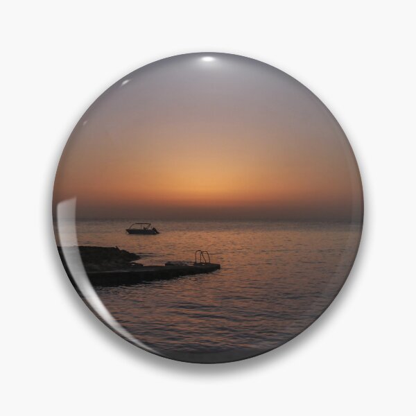 Item preview, Quiet Sunset Over Calm Sea With Small Boat Near Rocky Pier and Ladder at Dusk designed and sold by Nmallia.