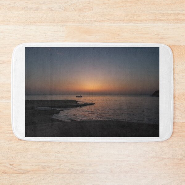 Item preview, Quiet Sunset Over Calm Sea With Small Boat Near Rocky Pier and Ladder at Dusk designed and sold by Nmallia.