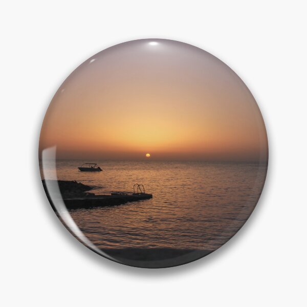 Item preview, Quiet Sunset Over Calm Sea With Small Boat Near Rocky Pier and Ladder at Dusk designed and sold by Nmallia.