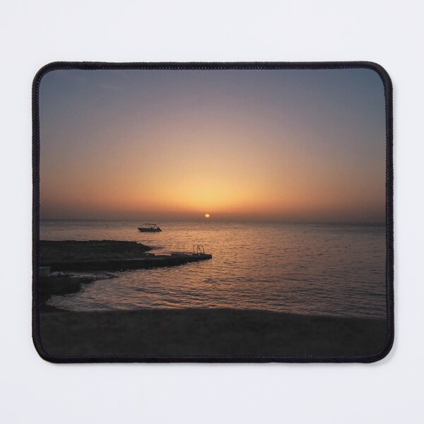 Item preview, Quiet Sunset Over Calm Sea With Small Boat Near Rocky Pier and Ladder at Dusk designed and sold by Nmallia.
