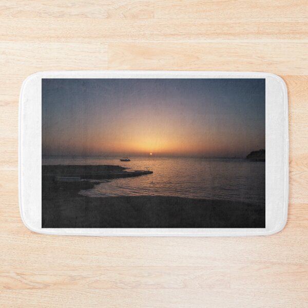 Item preview, Quiet Sunset Over Calm Sea With Small Boat Near Rocky Pier and Ladder at Dusk designed and sold by Nmallia.