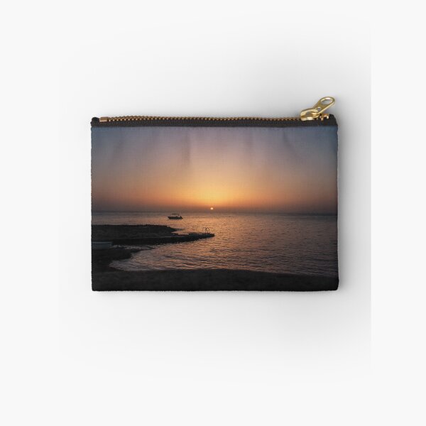 Item preview, Quiet Sunset Over Calm Sea With Small Boat Near Rocky Pier and Ladder at Dusk designed and sold by Nmallia.