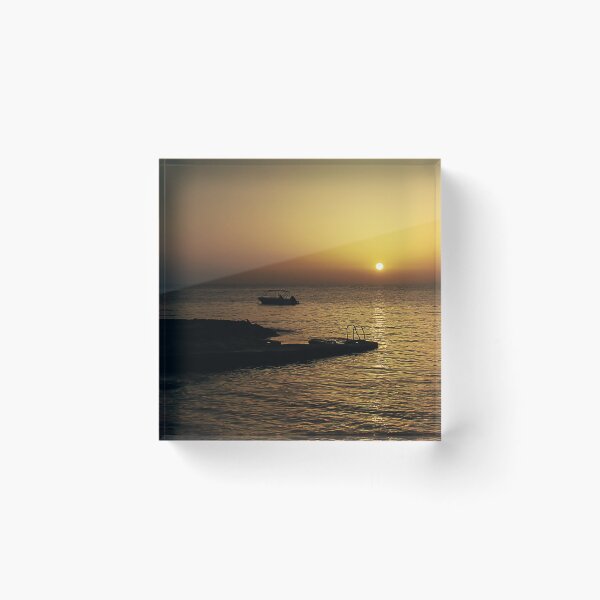 Item preview, Quiet Sunset Over Calm Sea With Small Boat Near Rocky Pier and Ladder at Dusk designed and sold by Nmallia.