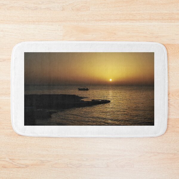 Item preview, Quiet Sunset Over Calm Sea With Small Boat Near Rocky Pier and Ladder at Dusk designed and sold by Nmallia.