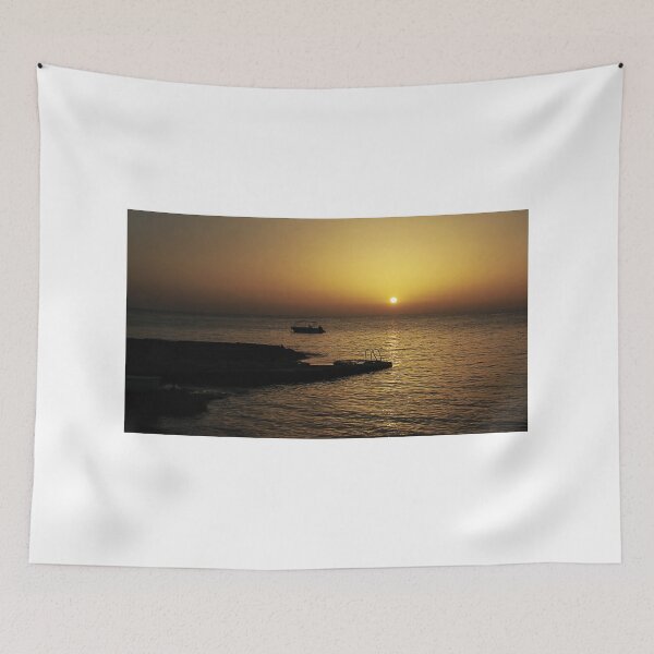 Item preview, Quiet Sunset Over Calm Sea With Small Boat Near Rocky Pier and Ladder at Dusk designed and sold by Nmallia.