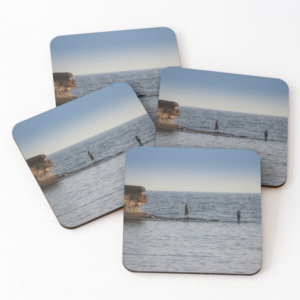 Item preview, Two Fishermen Fishing From Rocky Shoreline Near Cliffs At Calm Ocean Horizon During Evening designed and sold by Nmallia.