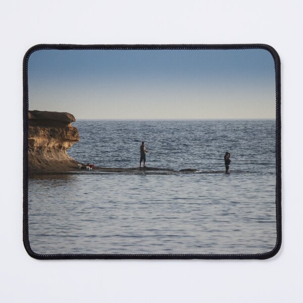 Item preview, Two Fishermen Fishing From Rocky Shoreline Near Cliffs At Calm Ocean Horizon During Evening designed and sold by Nmallia.