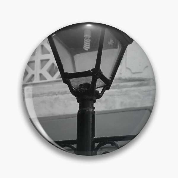 Item preview, Vintage Street Lamp In Black And White With Ornate Ironwork Against Old Building Facade designed and sold by Nmallia.