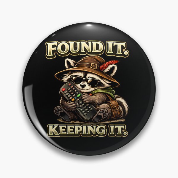 Item preview, Found It Keeping It Funny Raccoon Remote Control Gamer Vintage Graphic T-Shirt designed and sold by clockedoutwearshop.