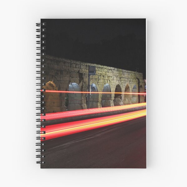 Item preview, Night Light Trails Along Historic Stone Arches and Archway Bridge With Fast Moving Traffic designed and sold by Nmallia.