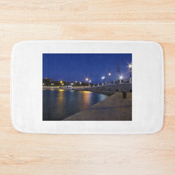 Item preview, Night Harbor Lights and Reflections on Waterfront Promenade at Blue Hour designed and sold by Nmallia.