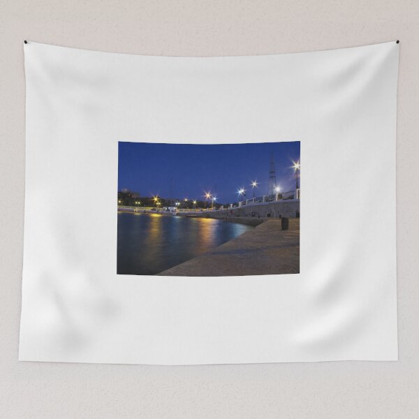 Item preview, Night Harbor Lights and Reflections on Waterfront Promenade at Blue Hour designed and sold by Nmallia.