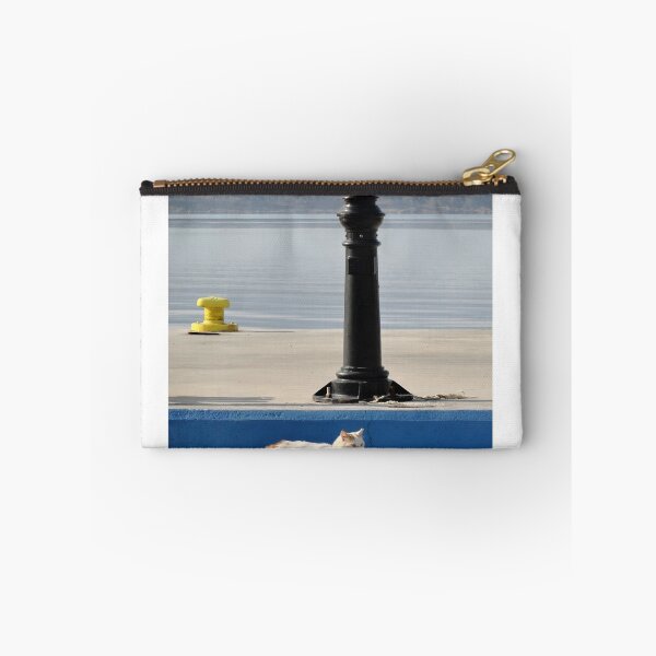 Item preview, Fluffy white cat on a blue quay at a Greek island harbor designed and sold by aeolia.